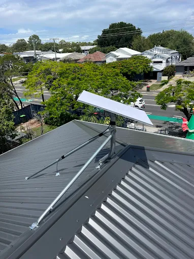 Starlink dish installed on a tin roof